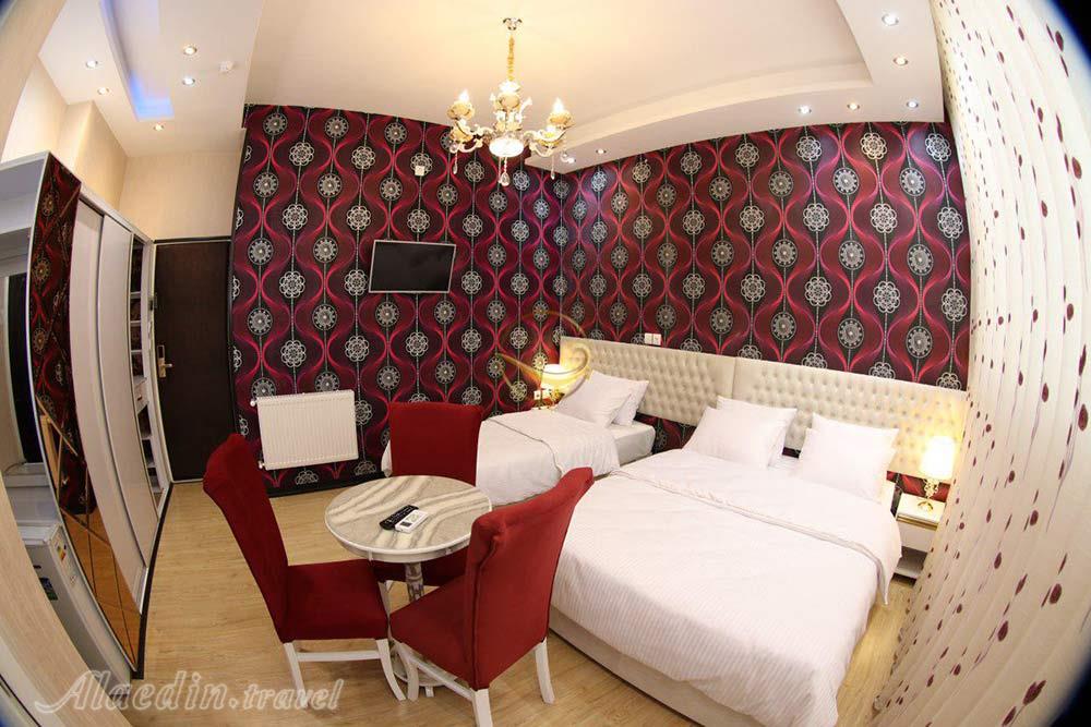 اتاق تریپل با تخت کینگ سایز هتل 4 ستاره الوند قم | علاءالدین تراول